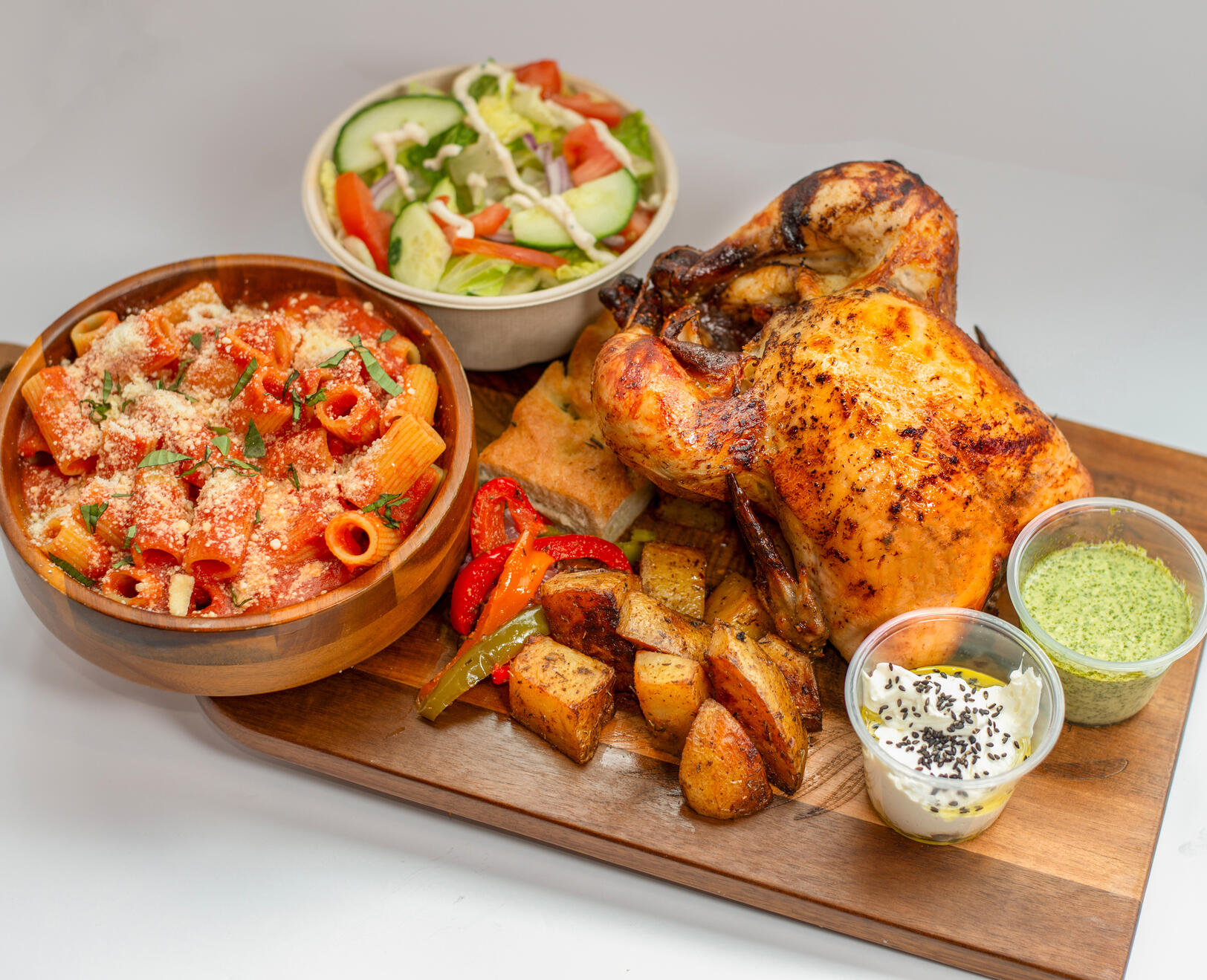 Family Whole Chicken Meal Bring everyone to the table with our signature whole rotisserie chicken — juicy inside, crispy outside, and served with generous sides, house-made focaccia, and flavorful sauces. It is a complete, satisfying meal that comfortably
